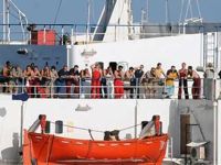 Oct. 6: Somali pirates who seized a Ukranian ship vow to fight to the death against superpowers; here, the crew emerges after a U.S. Navy welfare check. 