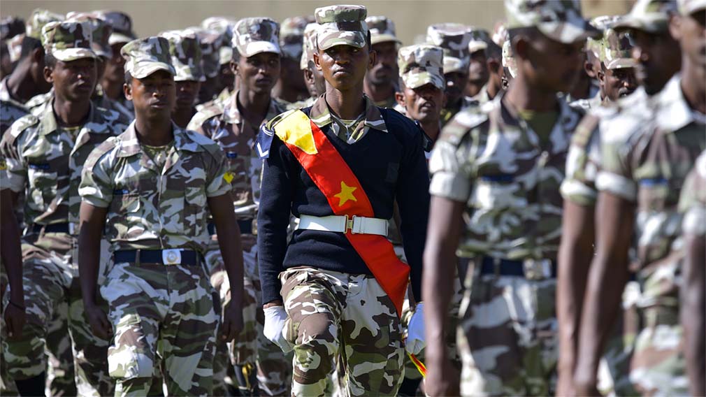 Members of the Tigray region special police force parade during celebrations marking the 45th anniversary of the launching of the “Armed Struggle of the Peoples of Tigray” in Mekelle, Ethiopia, on Feb. 19. MICHAEL TEWELDE/AFP VIA GETTY IMAGES