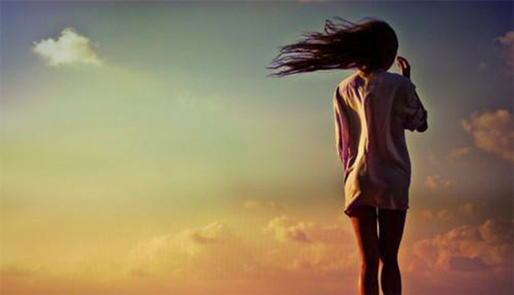 A woman on sunset