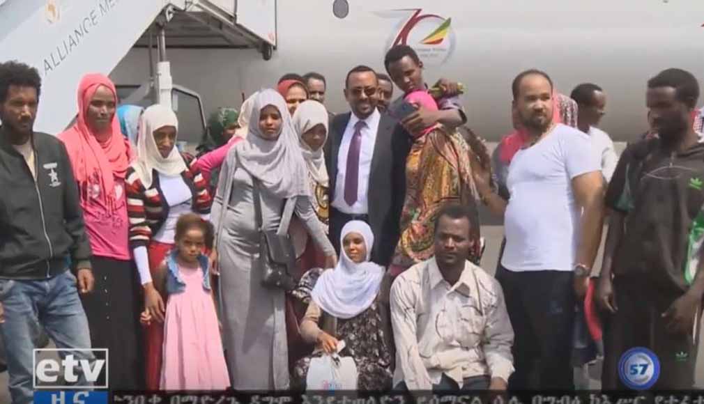 PM Abiy Ahmed with freed Ethiopian prisoners in Egypt